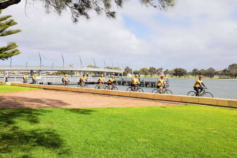 Cyclists riding along Mandurah foreshore